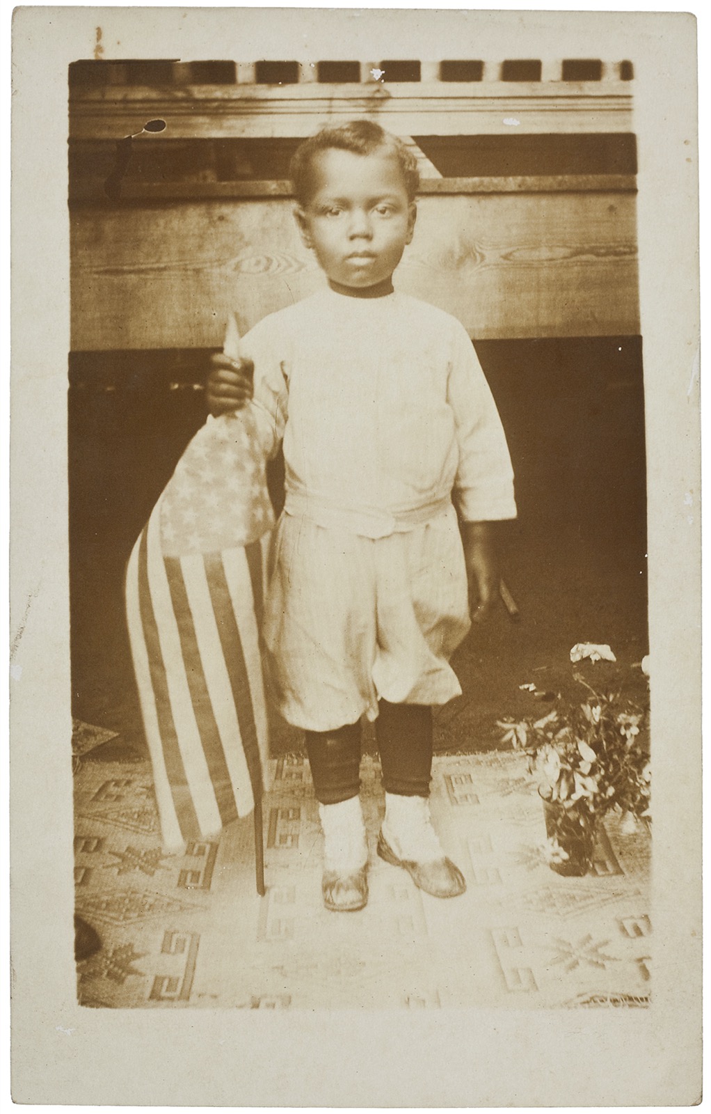 “Black Boy with Flag,” from the Robert L. Scott Collection of 19th and 20th Century African American Vernacular Photography